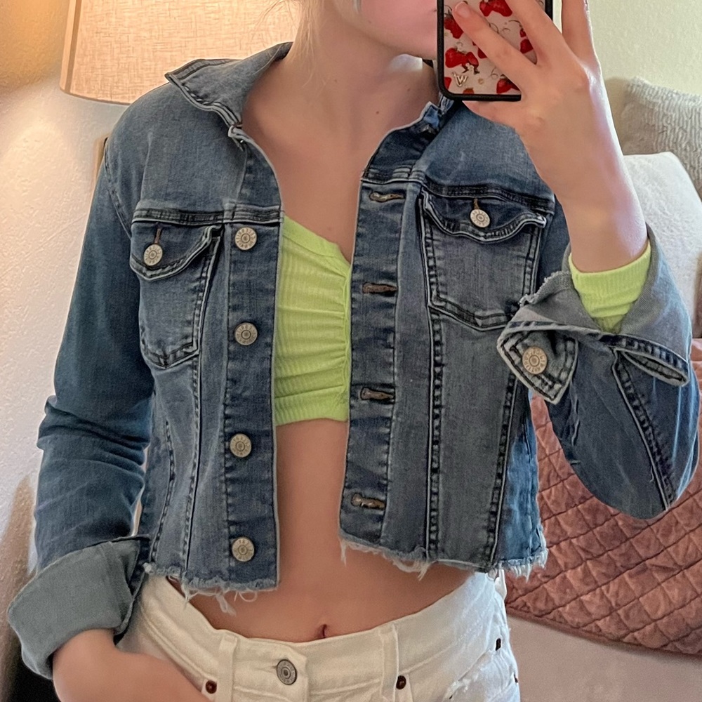 celebrity and pink cropped denim jacket